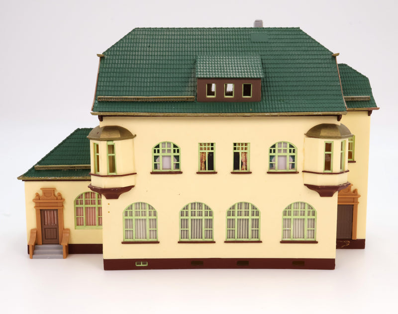 Tan Green House