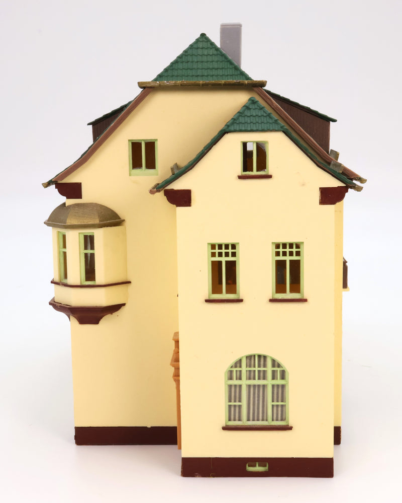Tan Green House