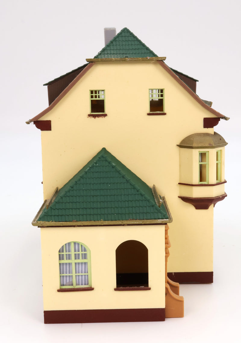 Tan Green House