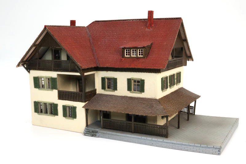 Tan Home Red Roof With Porch