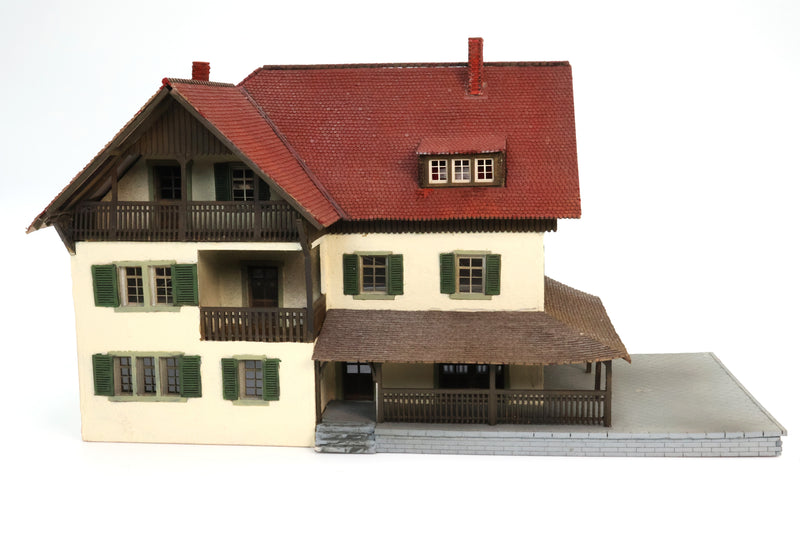 Tan Home Red Roof With Porch