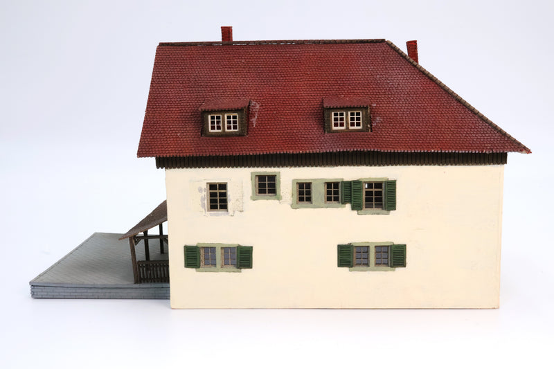 Tan Home Red Roof With Porch