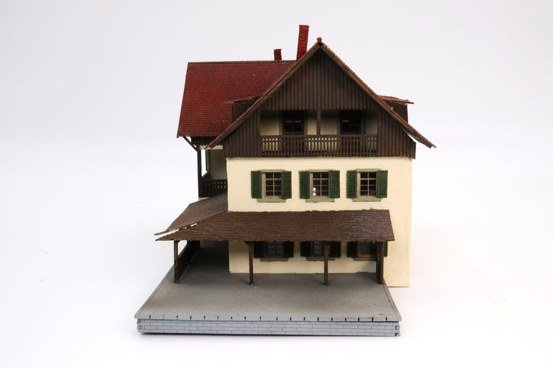 Tan Home Red Roof With Porch